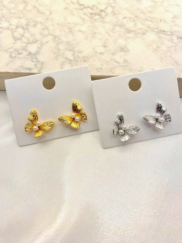 Arete estrellita con perlas minis