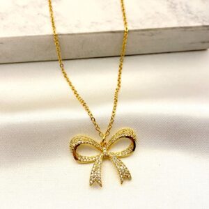 Collar dorado con moño